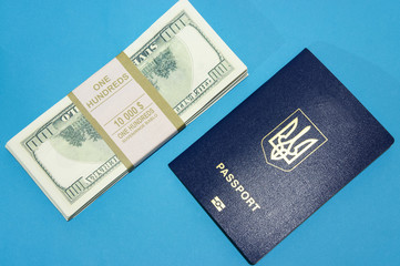 Passport and a lot of money on a blue background, travel, background
