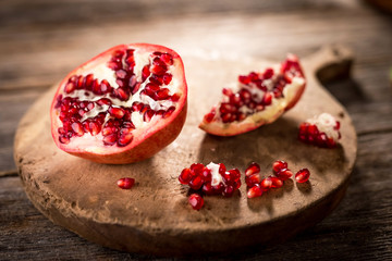 Pomegranate on wooden background
