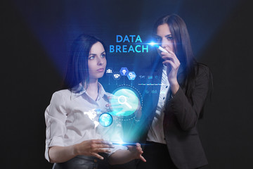 The concept of business, technology, the Internet and the network. A team of business women working on the virtual screen of the future and see the inscription: Data breach
