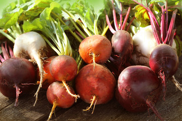 Fresh farm colorful beetroot on a wooden background. Detox and health. Selective focus. Red,...
