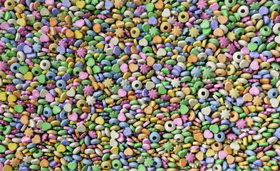 Fototapeta na wymiar Colorful sweet fruit candies background texture pattern