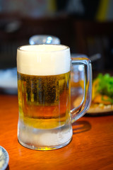 Glass mug with beer