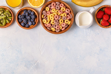 Colorful cereal rings in bowl.