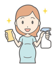 A pregnant woman in green dress is cleaning