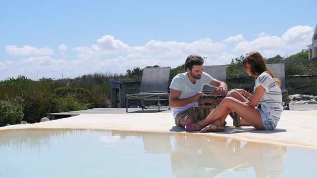 Couple playing backgammon