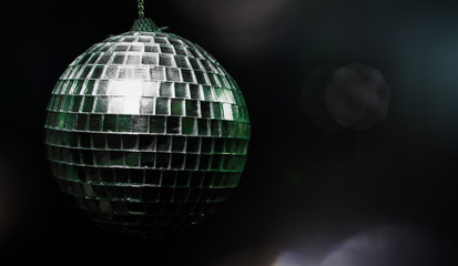 mirror ball on black background. with copy space.