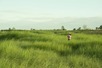 Girl shooting in the meadow/Girl in pink dress Photography in the vetiver field, natural backdrop.