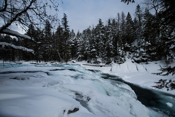 Fototapeta na wymiar McDonald Falls, Glacier National Park In Winter
