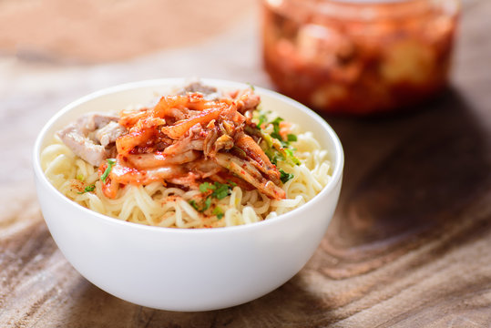 Korean food,instant noodle with kimchi cabbage in a bowl 