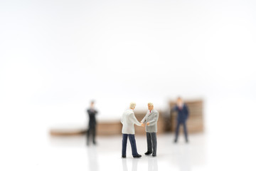 Obraz premium Miniature toy: Business man discussing about business , business ,financial, Success, Business Growth concept.