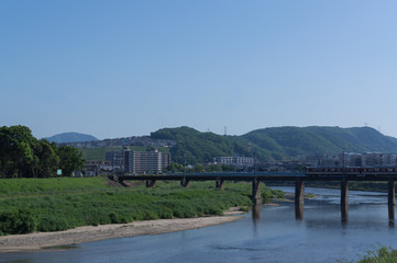 Fototapeta premium Country riverside villages in a sunny summer day.
