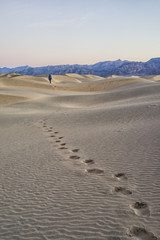 The Hiker at Sand Dune during Sunset at Death Valley National Park