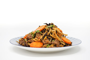 fried beef noodle food on the table