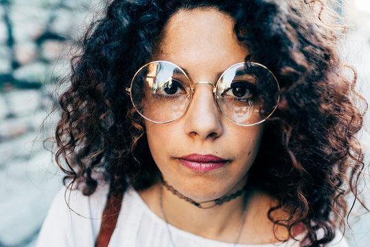 Woman in round large rimmed glasses, Milan, Italy