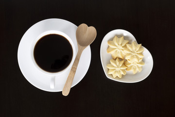 Cup of espresso coffee with cookies