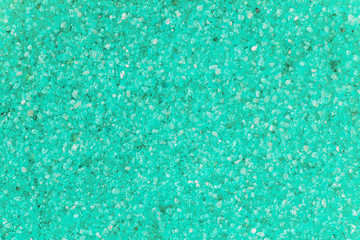 Bright turquoise natural sea salt crystals background