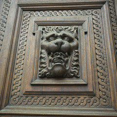 Close-up of carvings on wooden door, Prague, Czech Republic