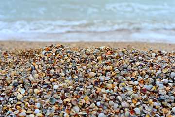 Soft wave of the sea on the sandy beach background