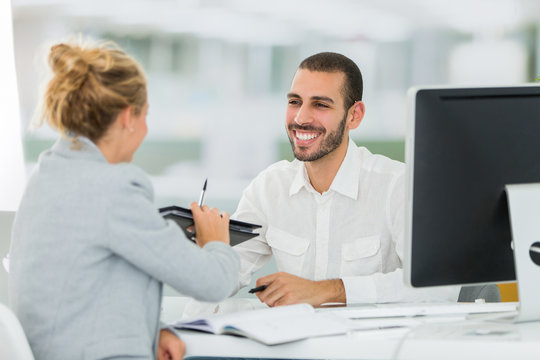 Business Meeting Between American Businesswoman And North African Businessman