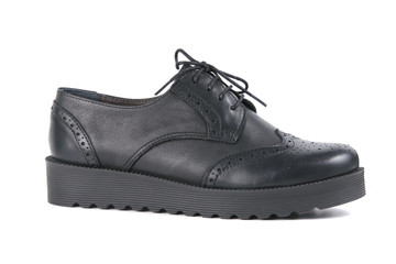 Female black leather shoe on white background, isolated product, comfortable footwear.