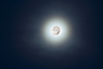 Full moon on night space with star.