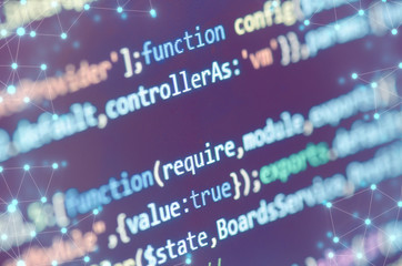 Programming Code On Computer Screen With Abstract Connection Net Closeup 