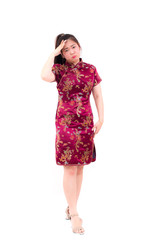 Asian woman wearing chinese dress cheongsam has Headache Against. Think Over, Concept with Sickness and Healthcare. Chinese New Year Festivities, New Year Celebration. on white background.