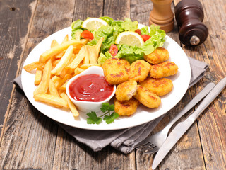 fried chicken,ketchup and french fries