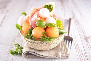 melon salad with prosciutto ham and mozzarella