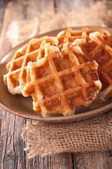 belgian waffle on wood background