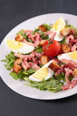 fresh salad with egg,bacon and tomato