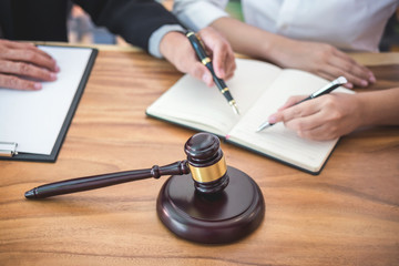 Male lawyer or judge consult having team meeting with client, Law and Legal services concept