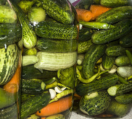 wonderful looking pickle pictures in glass jar,
glass jars of pickles, peppers, tomatoes, carrots, melon and wonderful marinade consisting of garlic

