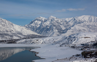 Obraz na płótnie Canvas Snow-capped mountains,the lake.Uzbekistan.