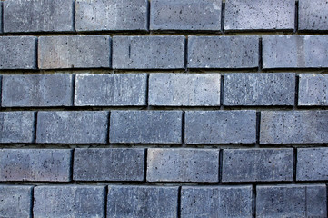 Obraz premium Abstract background and texture of gray square brick wall with seam pattern.