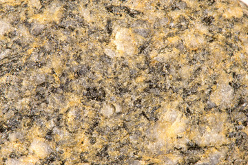 Granat mit Einsprenglingen von Feldspat und Biotit