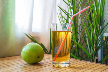 Apple juice and green fruit