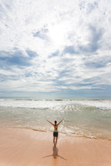 Sri Lanka - Ahungalla - A woman enjoying the sunshine at the beach