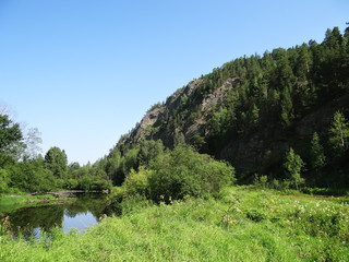 Fototapeta na wymiar Mount Bear-Stone and the Tagil River. Sverdlovsk region. Russia