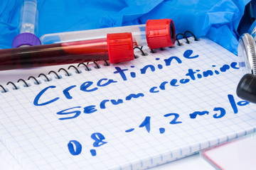 Creatinine or serum creatinine in basic metabolic test. Laboratory test tubes with blood,...