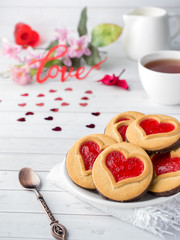 Homemade Cookies with a Red Jam Heart Valentine's Day Cup of tea