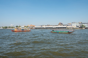 BANGKOK, THAILAND - December 22 2017: Tourists boats on Chao Phraya river.