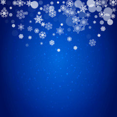 Snowflake border for Christmas and New Year celebration. Holiday snowflake border on blue background with sparkles. For banners, gift coupons, vouchers, ads, party events. Falling frosty snow.