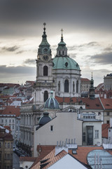 Obraz premium St. Nicholas Church viewed from Lesser Town Bridge Tower, Lesser Town, Prague, Czech Republic