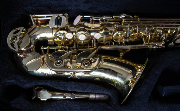 Golden saxophone in its case