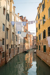 Fototapeta na wymiar clothes hung out to dry between the houses of Venice