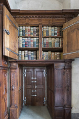 Books in cupboard in Old Royal Palace, Prague, Czech Republic