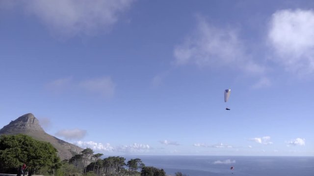 Para glider soars near Lion's Head mountain