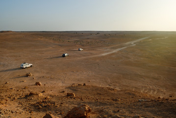 Fototapeta na wymiar Desert Safari. Off-road vehicles in the Sahara Desert, Libya. View from inside of the car.