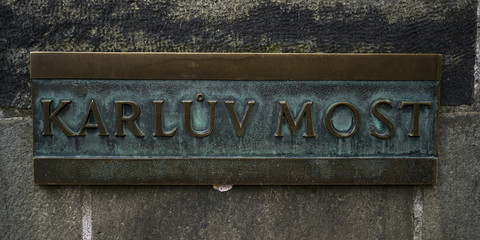 Close-up of Charles Bridge name sign in Czech language, Prague, Czech Republic